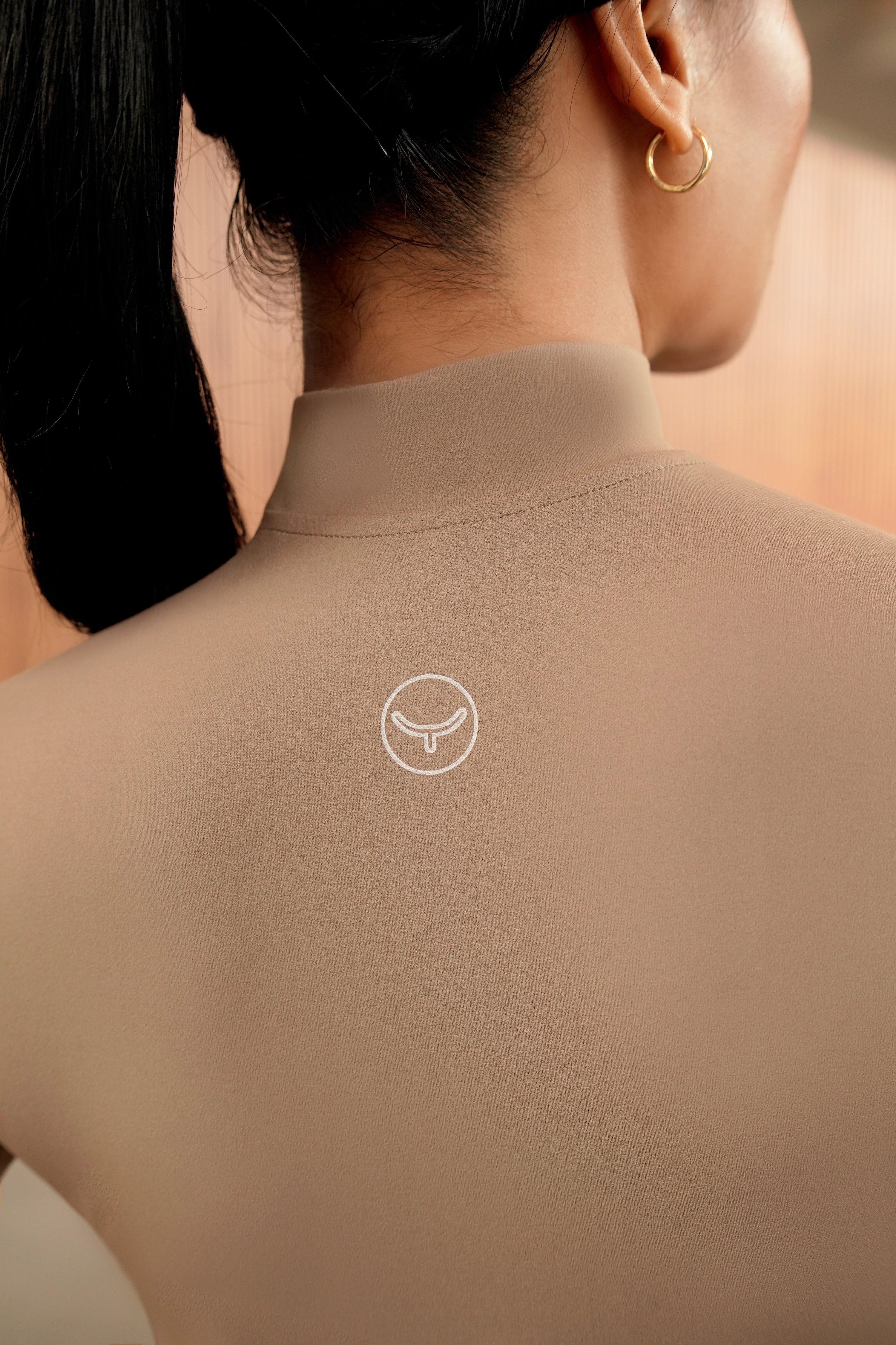 YUMI Zip Up Bodysuit